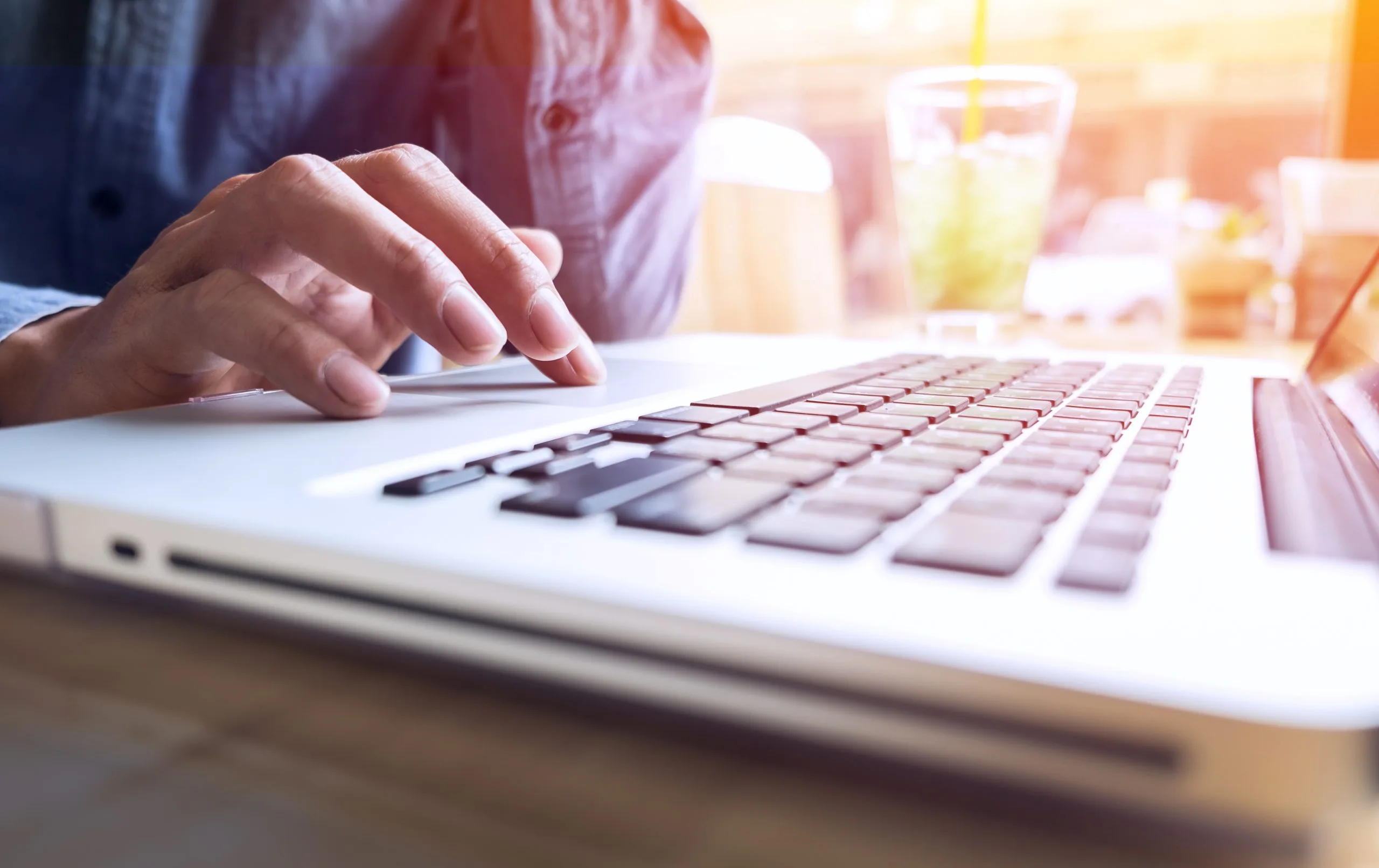 Close-up of typing male hands